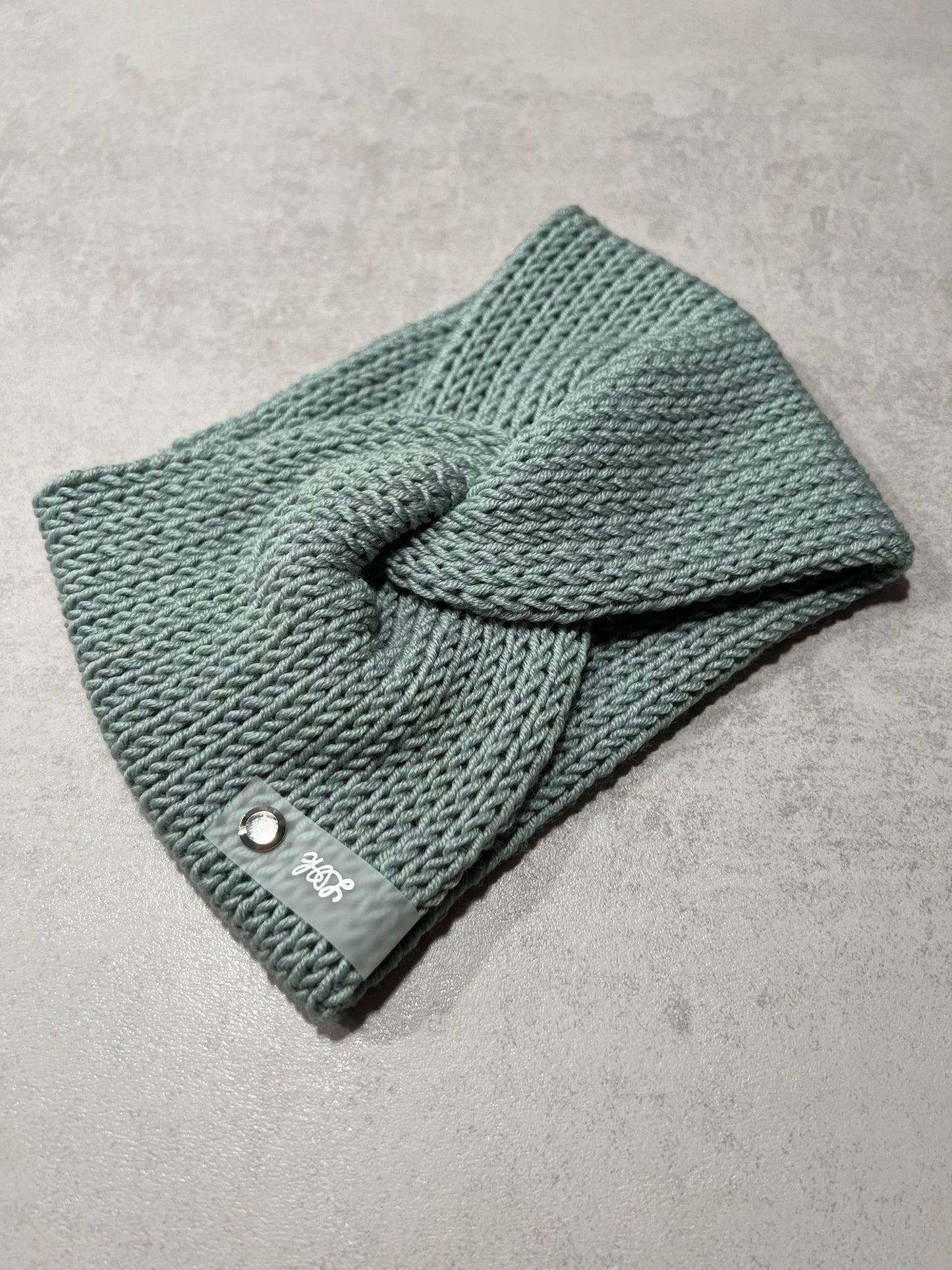 Stirnband Twist aus 100 % Merinowolle