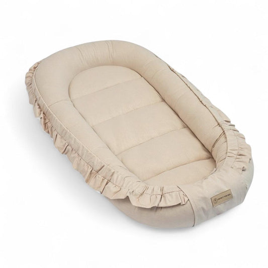 Babynestchen Baumwolle Rüschen – Verspielter mitwachsender Baby-Kokon