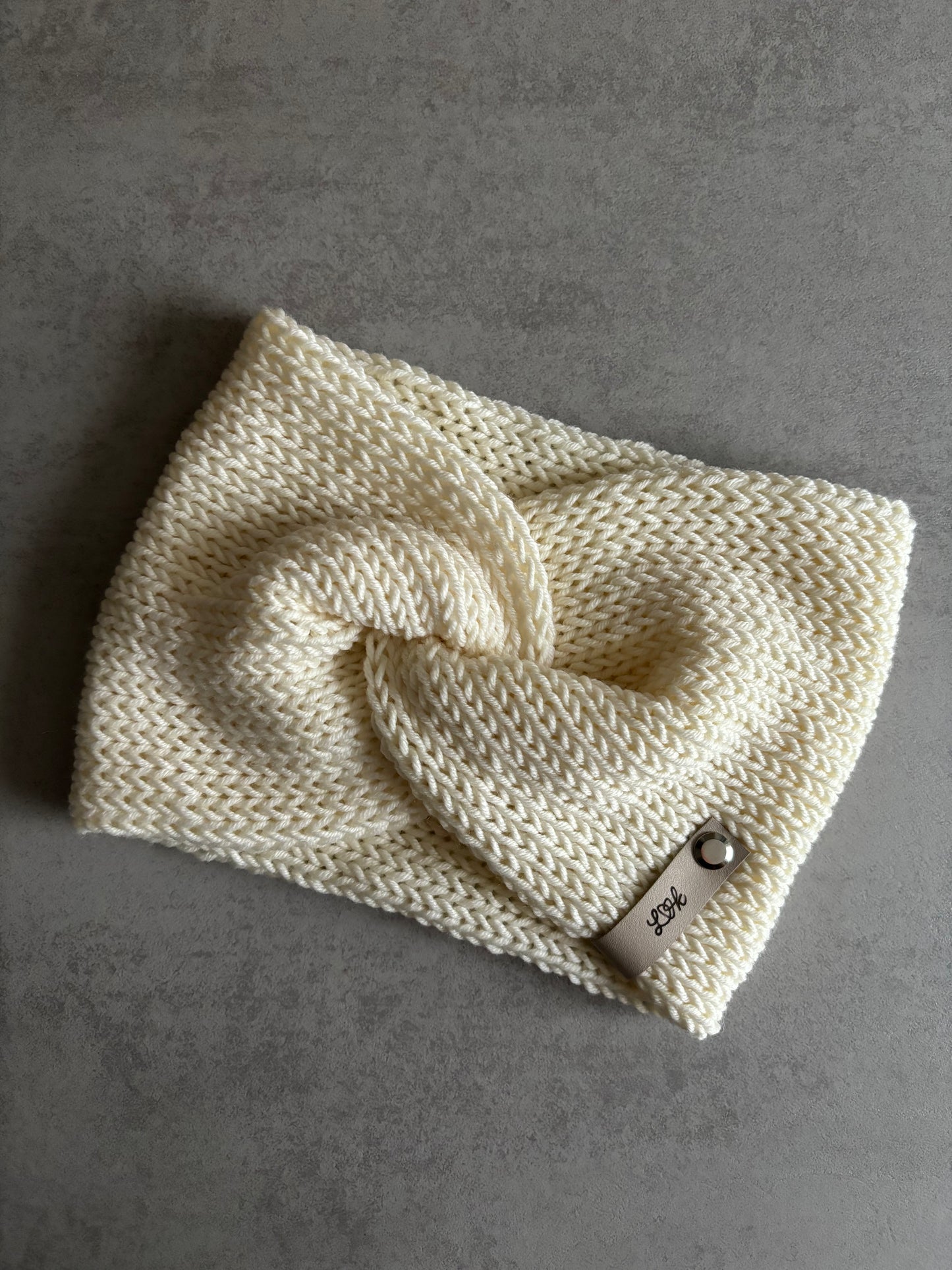 Stirnband Twist aus 100 % Merinowolle