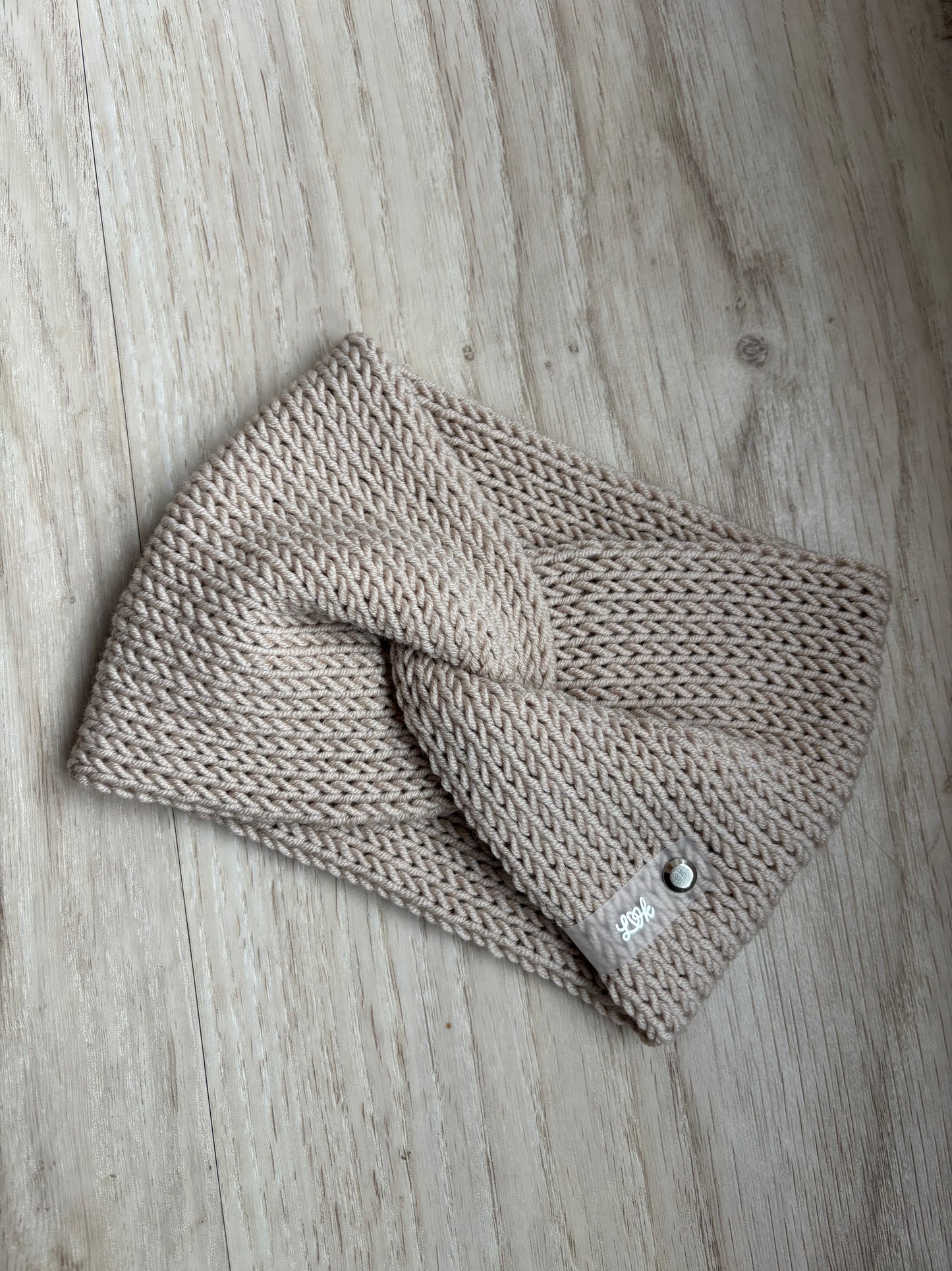 Stirnband Twist aus 100 % Merinowolle