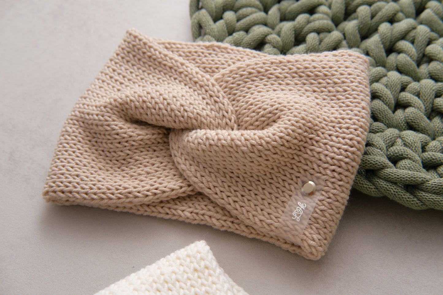Stirnband Twist aus 100 % Merinowolle