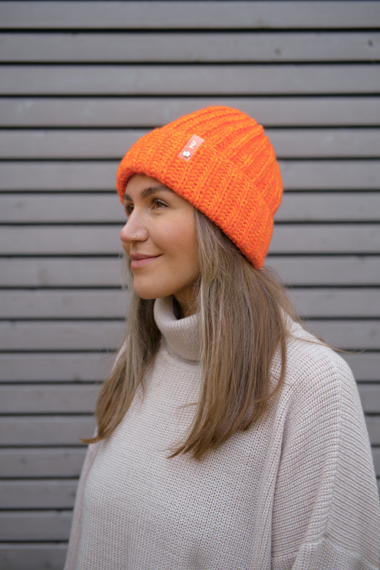 Hand-knitted hat in neon colors