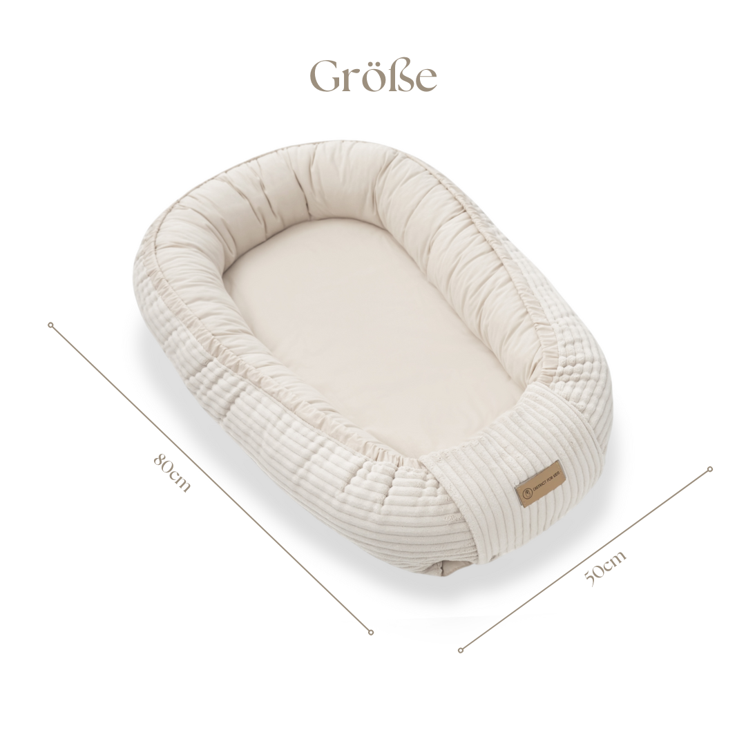 Babynestchen Cord  – Mitwachsender weicher Baby-Kokon