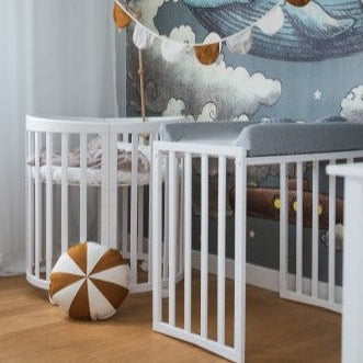 Babybett 7-in-1 – Ein Bett für viele Jahre - mitwachsend | Ovale Form