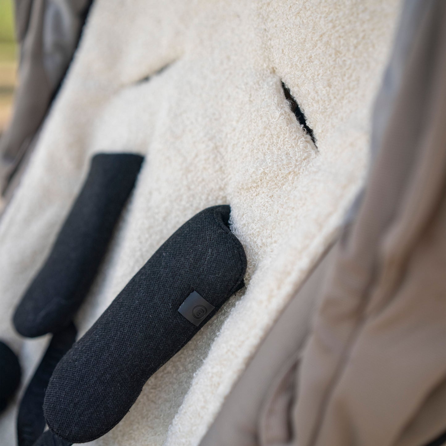 Sitzauflage Teddystoff Bouclé für den Kinderwagen - universell passend