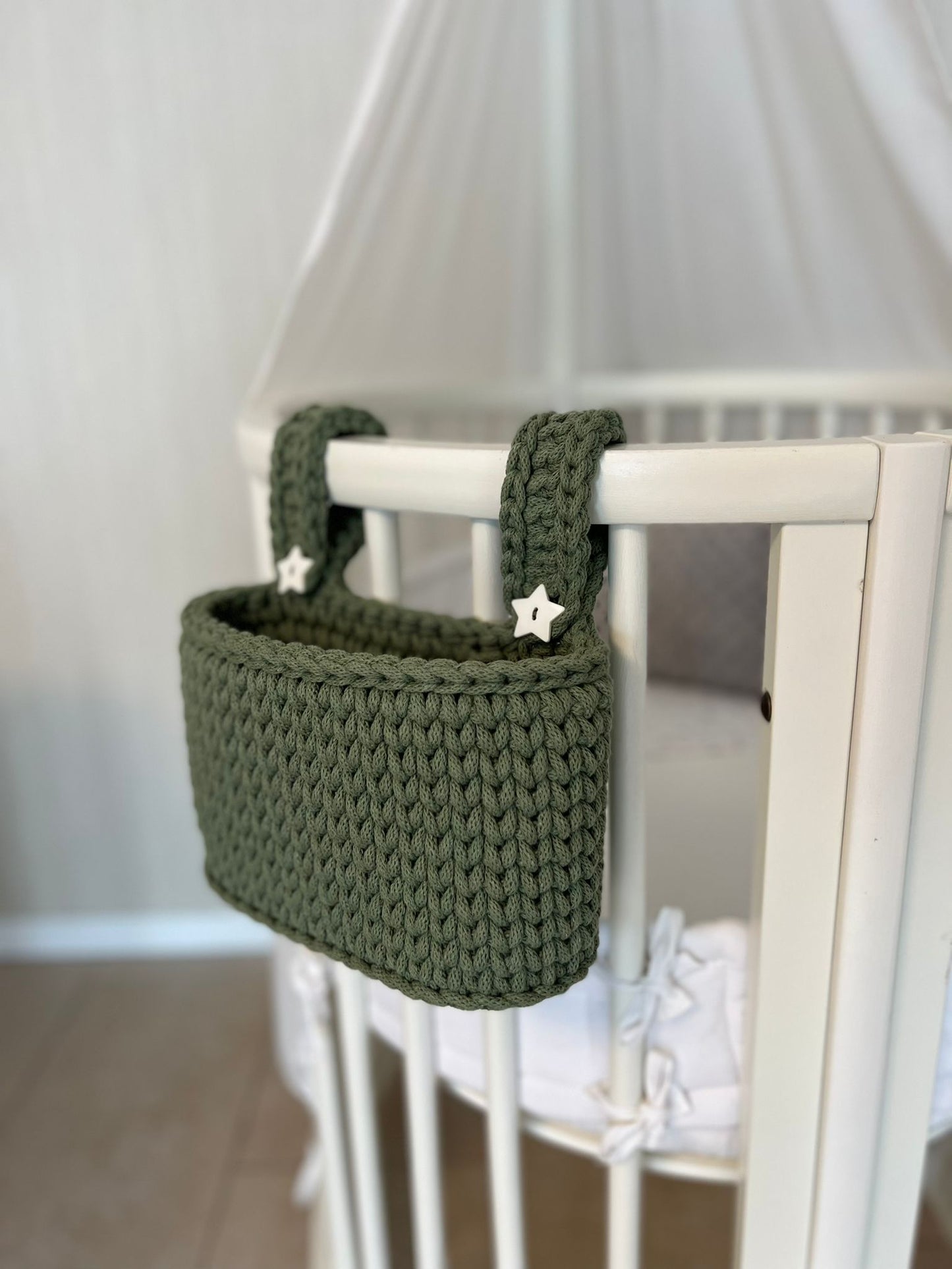 Hanging basket for the baby bed
