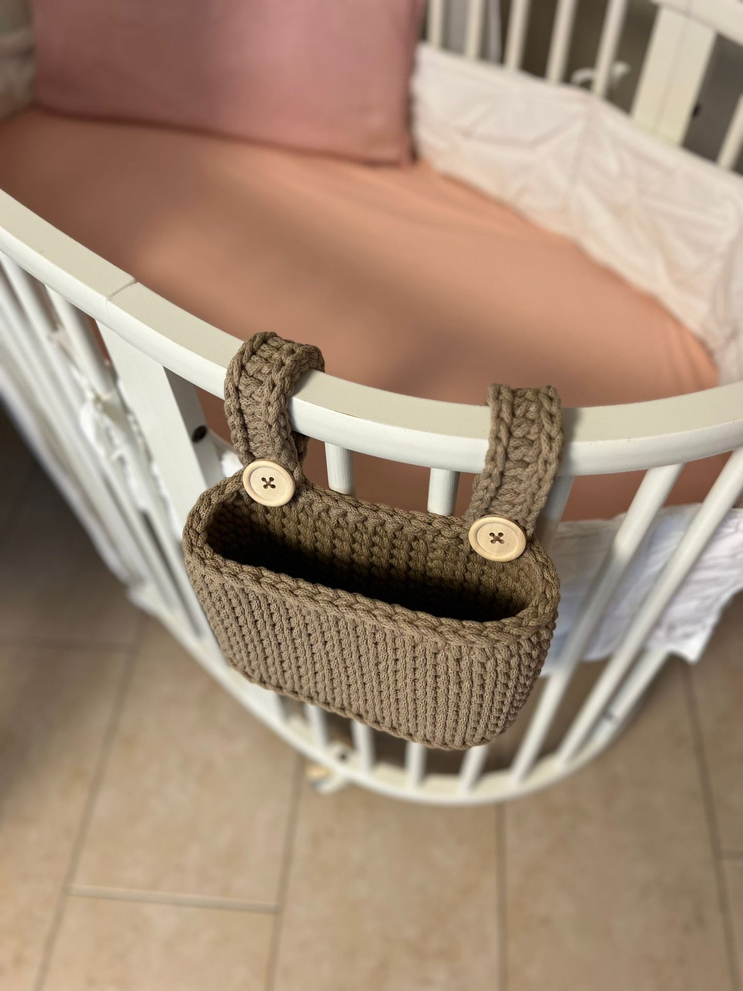 Hanging basket for the baby bed